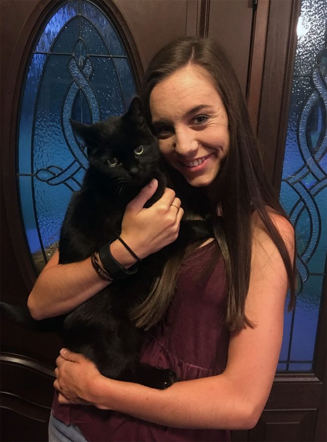 You may not know this but there are some cat people in Knoch high school.  Sophomore Tori Greenawalt with her favorite 15 year old cat, Lexi.