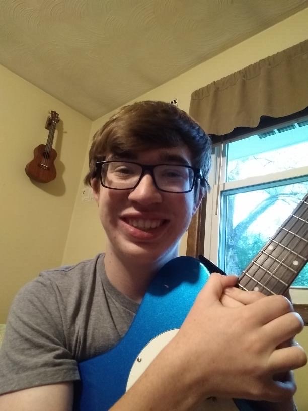 Freshman musician will “turn your frown upside down”